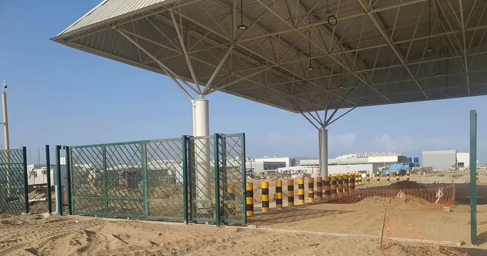 Security gate canopy with sliding gates and bollards